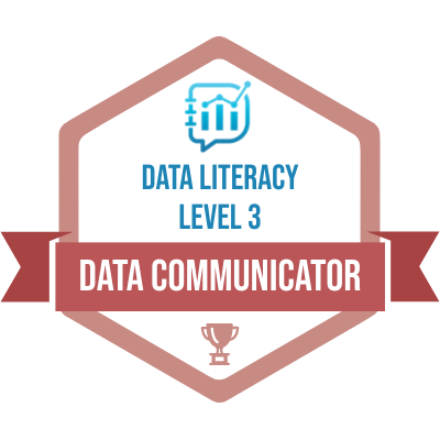 Data Literacy Data Communicator Badge. Badge is a hexagon. Inside at the top is the blue data literacy logo. Below in blue text it reads data literacy level 3. A red ribbon across the badge reads data communicator in white text. A red award sits at the bottom of the hexagon.
