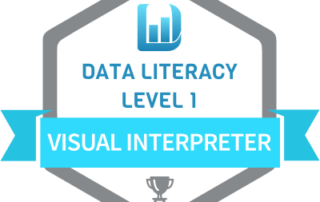 Blue badge with data literacy logo at top and an award at the bottom. Blue ribbon across reads data interpreter. Below logo it reads data literacy level 1.